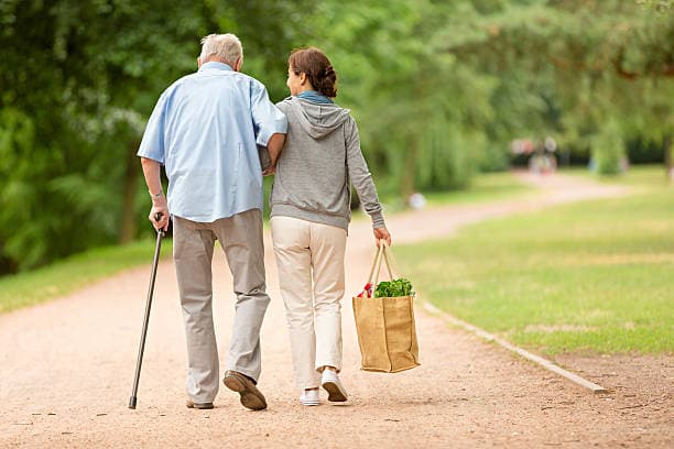 Companion care provider assisting elderly resident in North Myrtle Beach