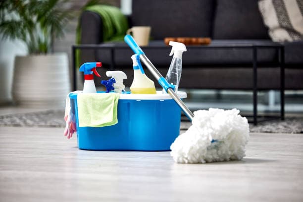 Residential house cleaning service wiping down a kitchen counter in Myrtle Beach